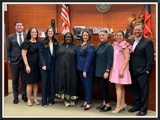 The Katie L. Lewis, P.C. Family Law Team supporting their newest attorney, Emmy Whitaker, at the courthouse.