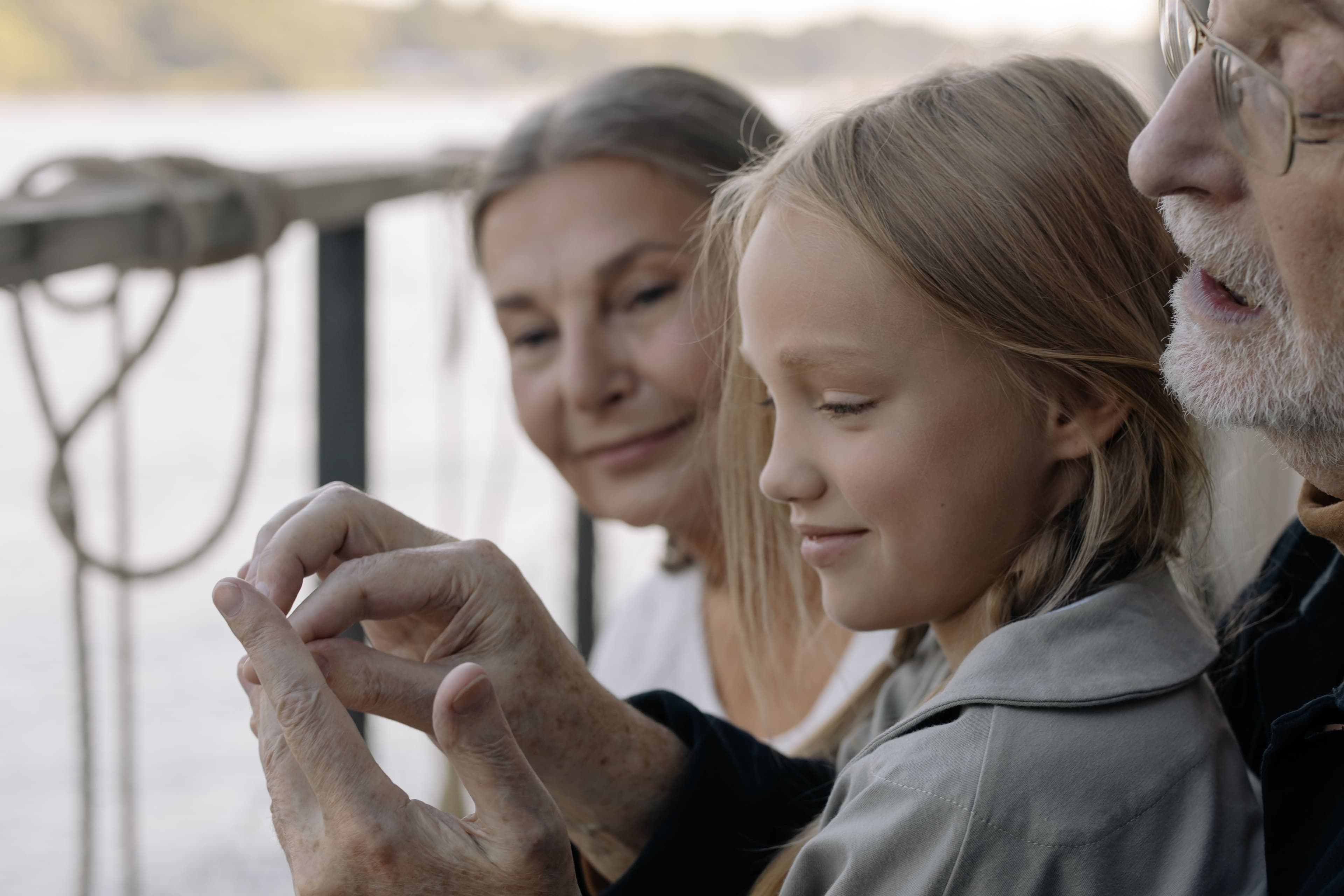 Grandparent and grandchild spending time together outdoors