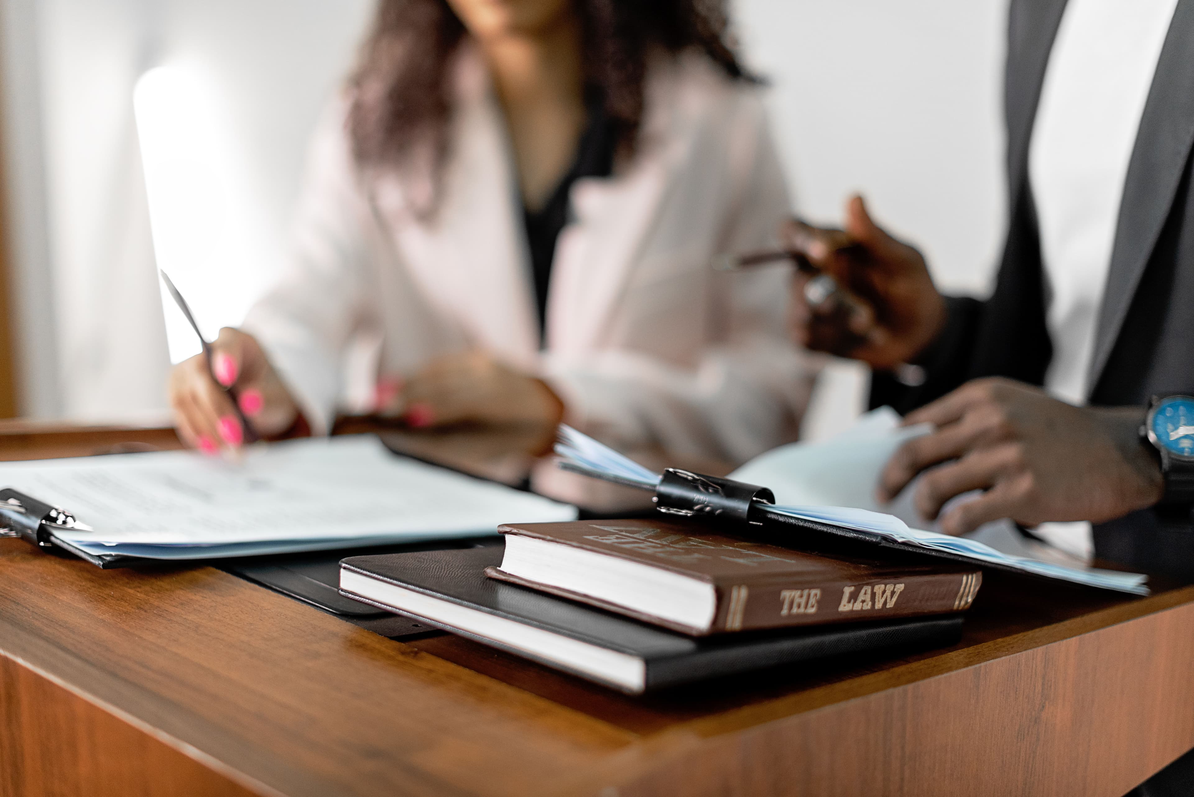 Attorney consulting with parents about custody and parental rights