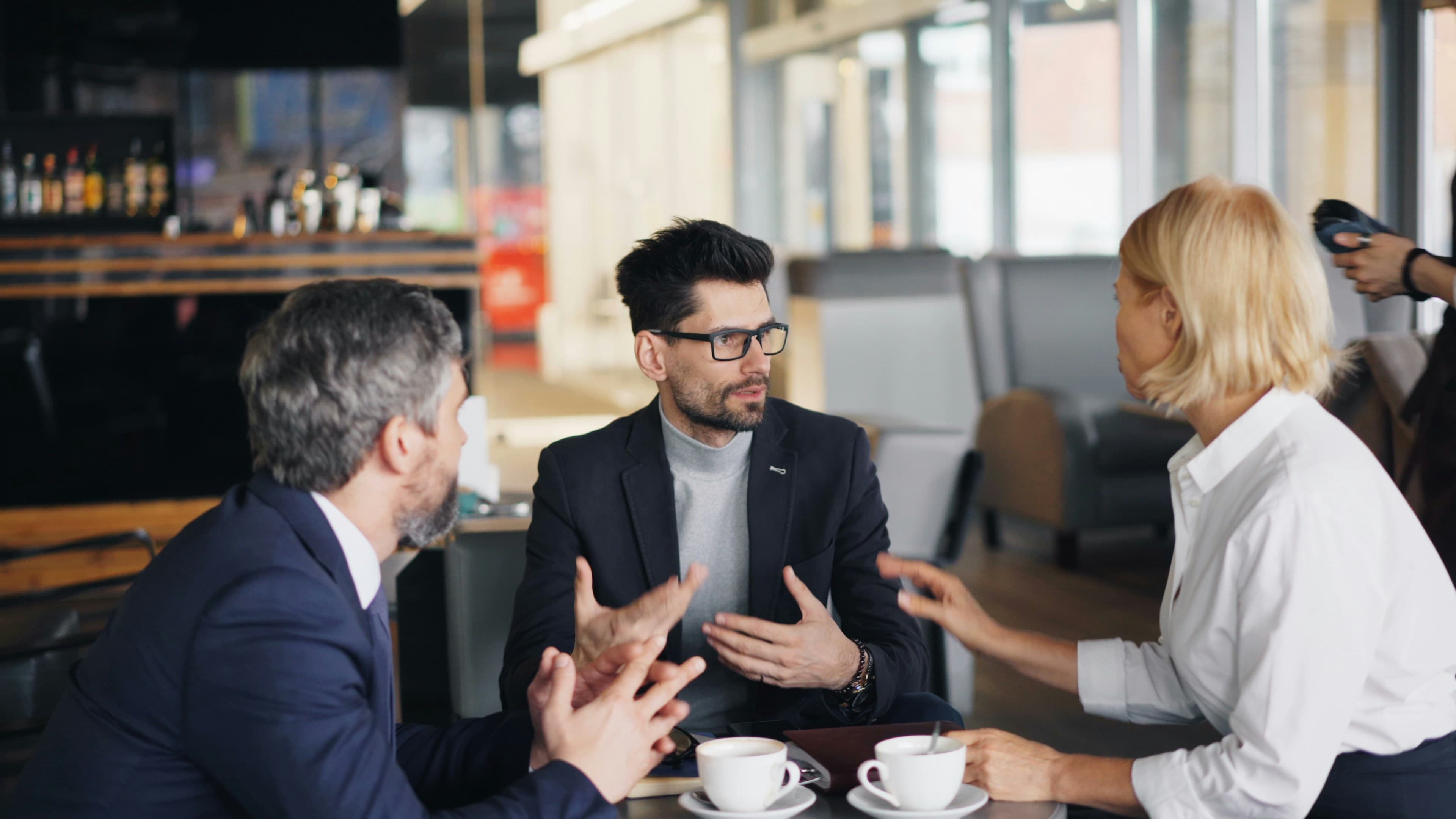 Professionals in a law office discussing spousal support matters